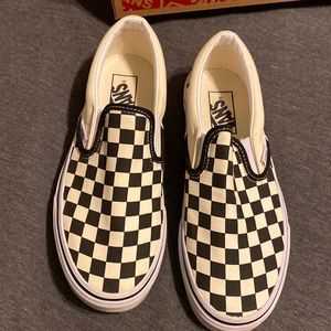 Checkered vans classic slip on with box. Lightly worn. Size 6.0 men. Women 7.5